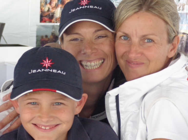 Jeanneau's Catherine Guiader, Valerie Toomey and Will Fenn are all smiles during the 2013 Annapolis Sailboat Show.
