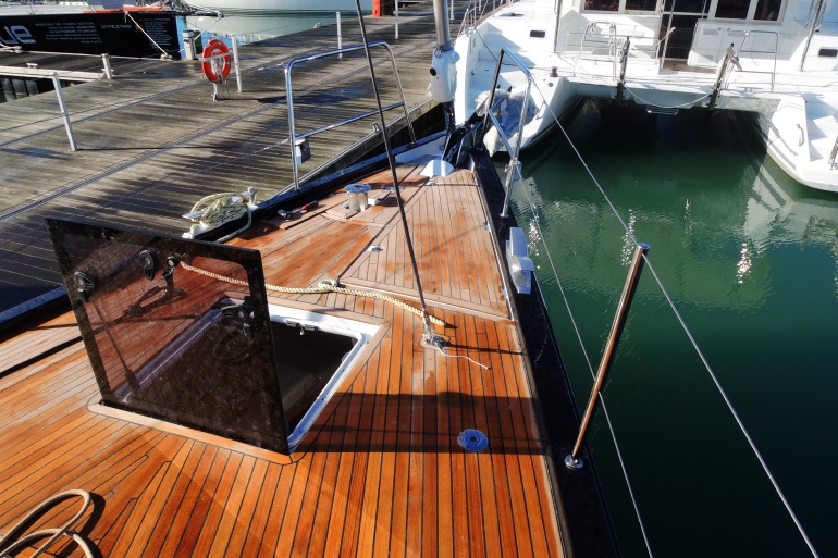The honey-colored teak deck really pops against the jet-black cap rail. If it's a yacht, and the 64 is, you gotta have teak decks. And why wouldn't you, they're gorgeous!